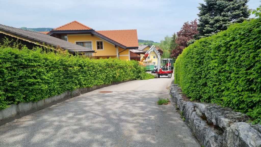 Sträucherschneiden mit dem Bagger